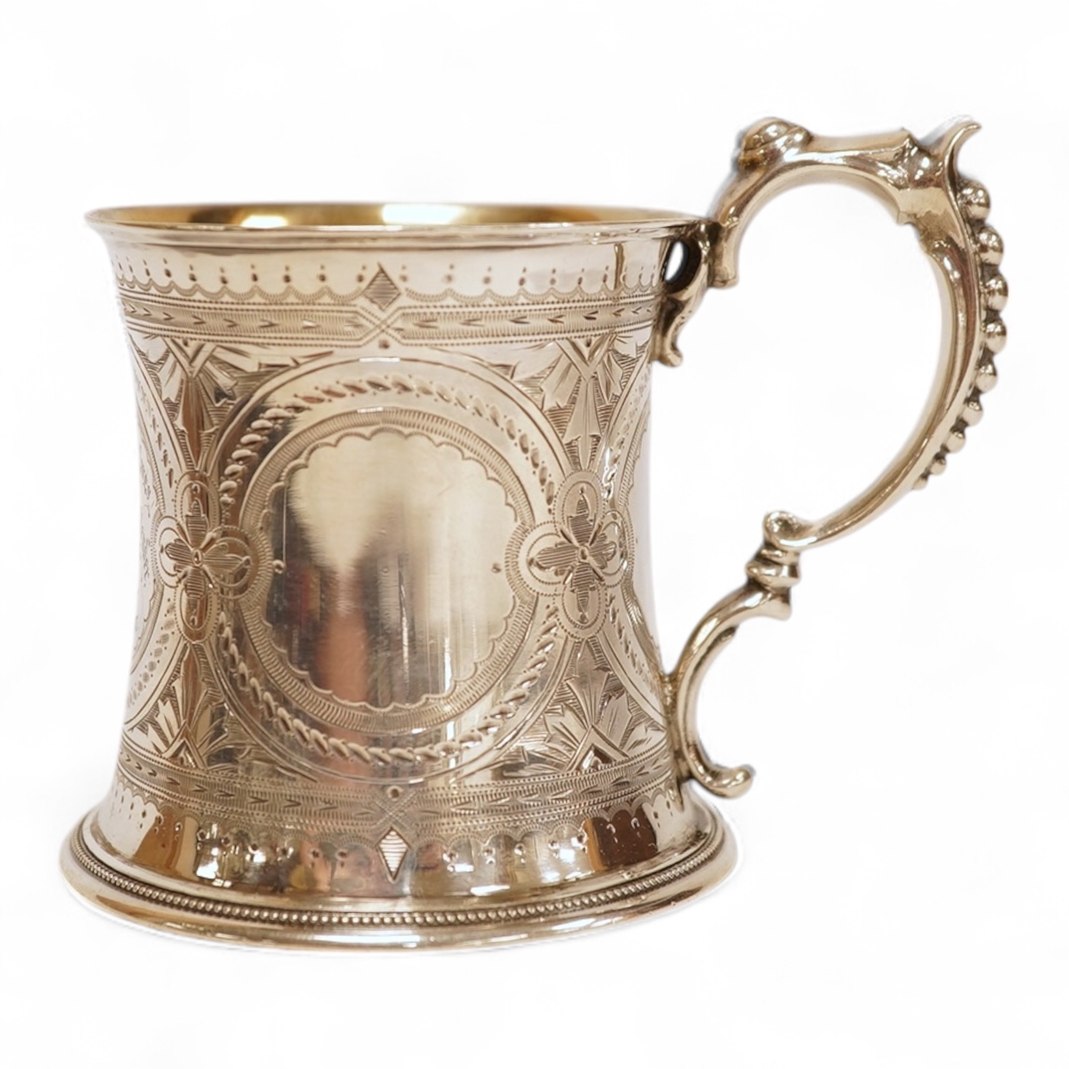 A Victorian bright cut engraved silver christening mug, of waisted form, with engraved inscription and beaded handle, Samuel Roberts & Charles Belk, Sheffield, 1867, 82mm, 5.2oz.